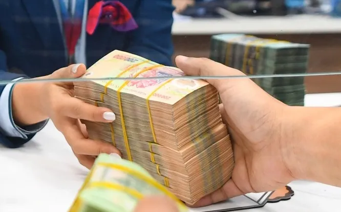 Giảm lãi suất cho vay để thúc đẩy tín dụng - Ảnh 1.