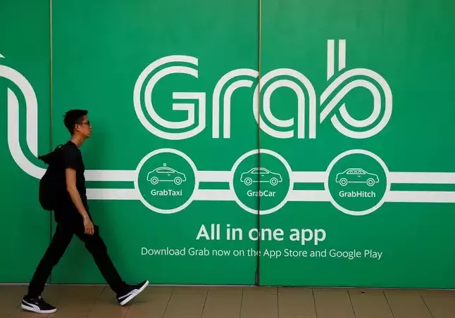 Grab bắt đầu đợt cắt giảm nhân sự lớn nhất - Ảnh 1. Grab bắt đầu đợt cắt giảm nhân sự lớn nhất - Ảnh 1.