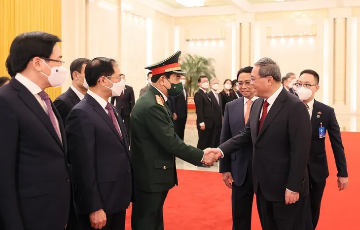 Lễ đón Thủ tướng Phạm Minh Chính thăm chính thức Trung Quốc - Ảnh 3. Lễ đón Thủ tướng Phạm Minh Chính thăm chính thức Trung Quốc - Ảnh 3.