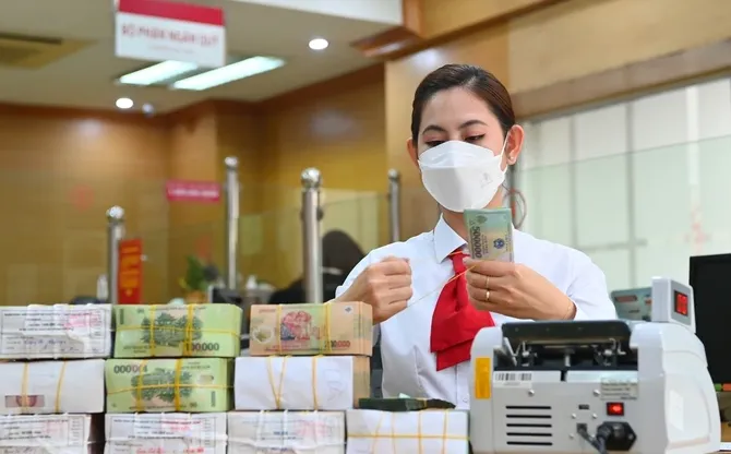 Thúc đẩy tín dụng hỗ trợ nền kinh tế - Ảnh 1. Thúc đẩy tín dụng hỗ trợ nền kinh tế - Ảnh 1.