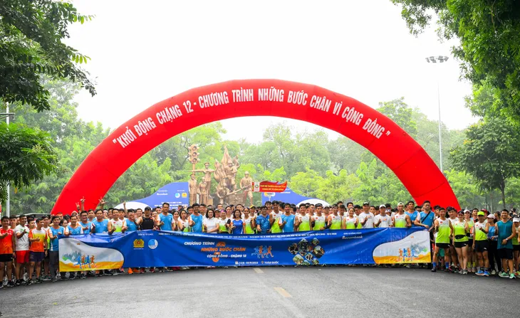 Những bước chân vì cộng đồng - Ảnh 1. Những bước chân vì cộng đồng - Ảnh 1.