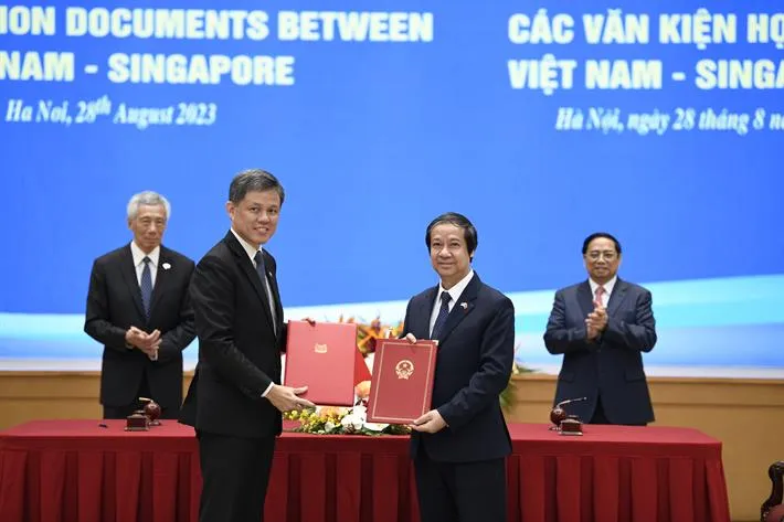 Ký kết bản ghi nhớ giữa Việt Nam và Singapore về hợp tác giáo dục - Ảnh 2. Ký kết bản ghi nhớ giữa Việt Nam và Singapore về hợp tác giáo dục - Ảnh 2.