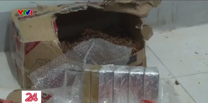 Hà Giang: Bắt 3 đối tượng vận chuyển 10 bánh heroin - Ảnh 2.