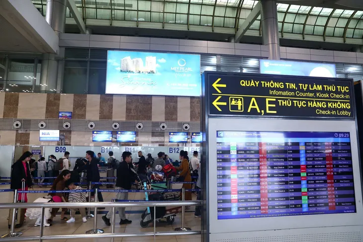 Sân bay Nội Bài rộn ràng sắc Xuân - Ảnh 5. Sân bay Nội Bài rộn ràng sắc Xuân - Ảnh 5.