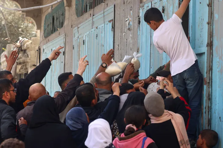 Bi thảm nạn đói ở Dải Gaza - Ảnh 2.