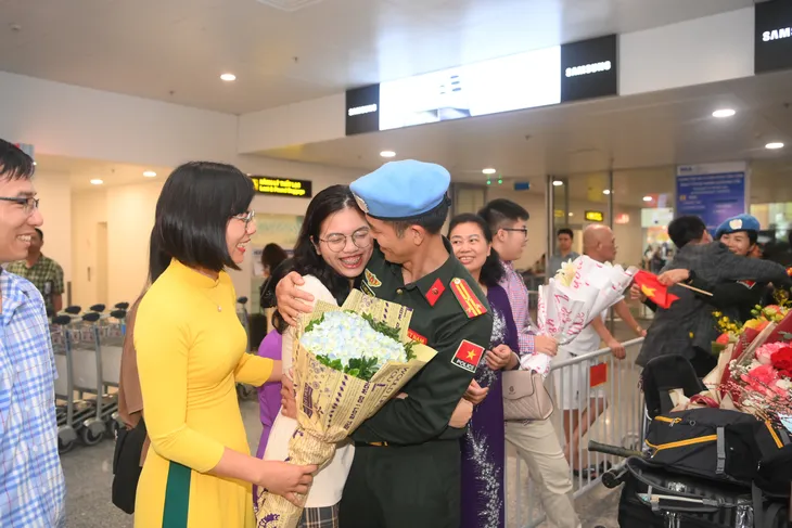 3 sĩ quan công an đầu tiên tham gia lực lượng GGHB LHQ tại Nam Sudan đã về đến Việt Nam - Ảnh 3. 3 sĩ quan công an đầu tiên tham gia lực lượng GGHB LHQ tại Nam Sudan đã về đến Việt Nam - Ảnh 3.
