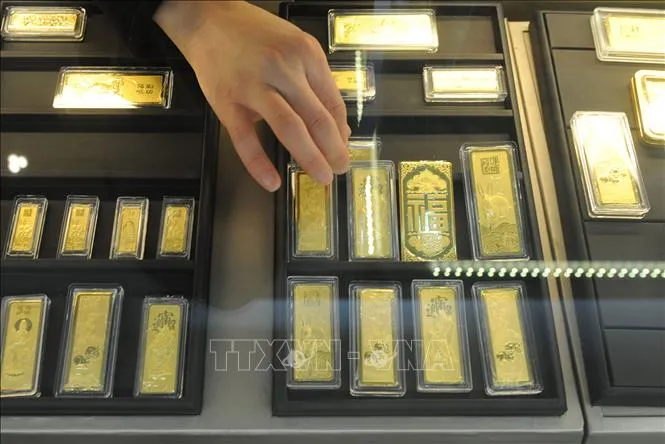 Hàng nghìn người tại Trung Quốc mua phải vàng giả - Ảnh 1. Hàng nghìn người tại Trung Quốc mua phải vàng giả - Ảnh 1.