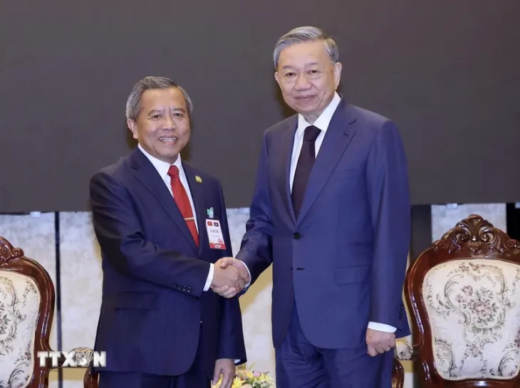 Không ngừng vun đắp quan hệ Việt Nam - Lào - Ảnh 1. Không ngừng vun đắp quan hệ Việt Nam - Lào - Ảnh 1.