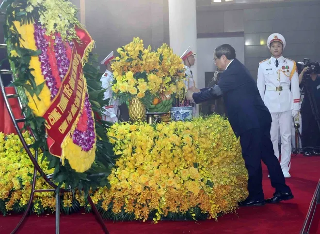 Cử hành trọng thể Lễ viếng Tổng Bí thư Nguyễn Phú Trọng tại Nhà tang lễ Quốc gia - Ảnh 12. Cử hành trọng thể Lễ viếng Tổng Bí thư Nguyễn Phú Trọng tại Nhà tang lễ Quốc gia - Ảnh 12.