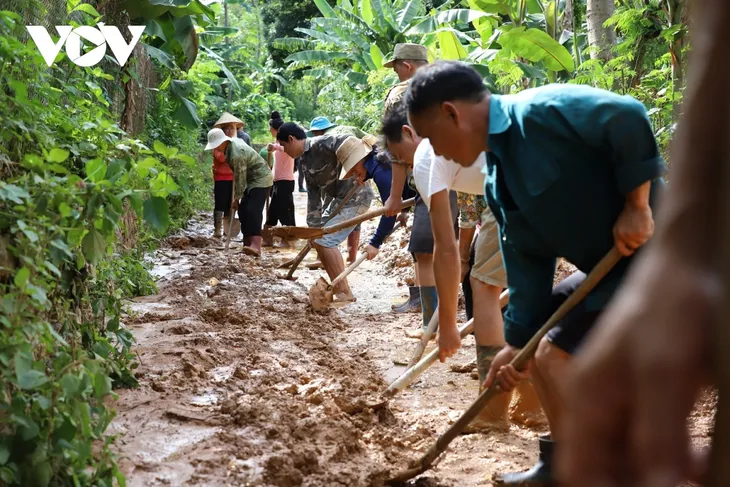 Vùng lũ Sơn La khắc phục thiệt hại thiên tai - Ảnh 1. Vùng lũ Sơn La khắc phục thiệt hại thiên tai - Ảnh 1.