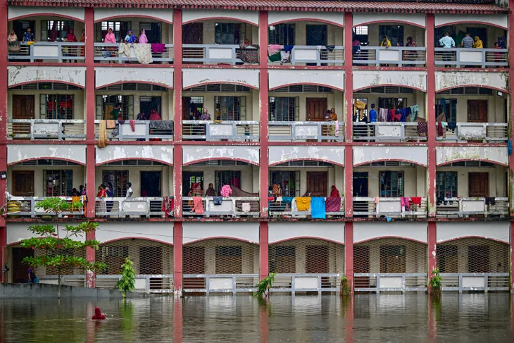 20 người thiệt mạng, 5 triệu người bị ảnh hưởng do lũ lụt ở Bangladesh - Ảnh 1. 20 người thiệt mạng, 5 triệu người bị ảnh hưởng do lũ lụt ở Bangladesh - Ảnh 1.