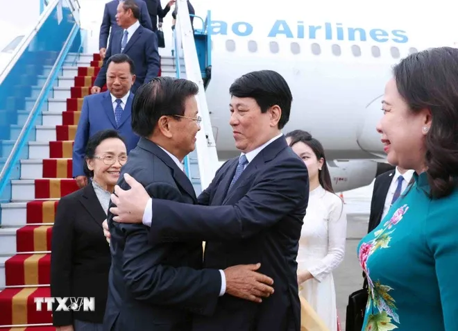 Tổng Bí thư, Chủ tịch nước Lào Thongloun Sisoulith đến Hà Nội, bắt đầu thăm cấp Nhà nước tới Việt Nam - Ảnh 1. Tổng Bí thư, Chủ tịch nước Lào Thongloun Sisoulith đến Hà Nội, bắt đầu thăm cấp Nhà nước tới Việt Nam - Ảnh 1.
