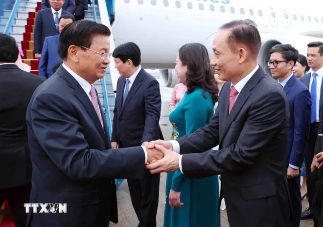 Tổng Bí thư, Chủ tịch nước Lào Thongloun Sisoulith đến Hà Nội, bắt đầu thăm cấp Nhà nước tới Việt Nam - Ảnh 4. Tổng Bí thư, Chủ tịch nước Lào Thongloun Sisoulith đến Hà Nội, bắt đầu thăm cấp Nhà nước tới Việt Nam - Ảnh 4.