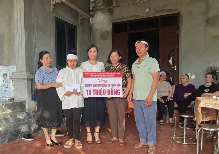 Hai anh em “đập lợn” ủng hộ 15 triệu đồng ủng hộ bạn mồ côi cha mẹ do bão số 3 - Ảnh 1. Hai anh em “đập lợn” ủng hộ 15 triệu đồng ủng hộ bạn mồ côi cha mẹ do bão số 3 - Ảnh 1.