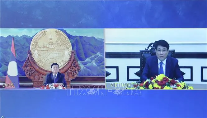 Vun đắp mối quan hệ vĩ đại, đoàn kết đặc biệt và hợp tác toàn diện Việt Nam - Lào - Ảnh 1. Vun đắp mối quan hệ vĩ đại, đoàn kết đặc biệt và hợp tác toàn diện Việt Nam - Lào - Ảnh 1.