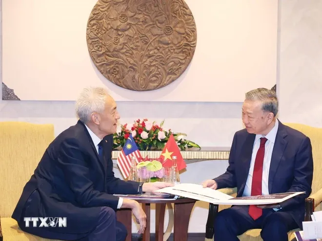 Tổng Bí thư Tô Lâm hoan nghênh doanh nghiệp Malaysia đầu tư, làm ăn lâu dài ở Việt Nam - Ảnh 1. Tổng Bí thư Tô Lâm hoan nghênh doanh nghiệp Malaysia đầu tư, làm ăn lâu dài ở Việt Nam - Ảnh 1.