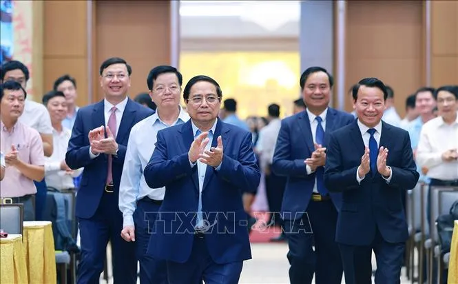 Thủ tướng Phạm Minh Chính chủ trì hội nghị trực tuyến toàn quốc về xây dựng nông thôn mới và giảm nghèo - Ảnh 1.