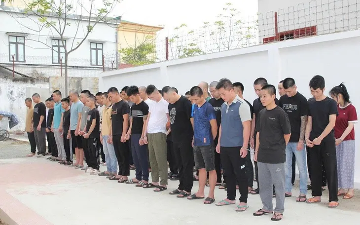 Các đối tượng lừa đảo xuyên Quốc gia bị bắt giữ. Ảnh CANA. Các đối tượng lừa đảo xuyên Quốc gia bị bắt giữ. Ảnh CANA.
