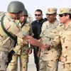 Egypt says 25 militants killed in air strikes as Sisi inspects troops