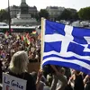 Paris protesters urge Greeks to say 'no' to austerity