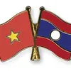 Vietnam, Laos hold government office conference