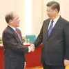 NA Chairman Nguyen Sinh Hung meets President Xi Jinping