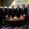 Vietnam, Laos boost investment ties