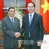 State president receives head of Lao presidential office