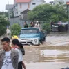 Torrential night rain causes floods across Ha Noi