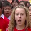 Charity national anthem singing girl arrives in Danang