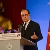 Hollande lectures students