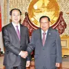 State President Tran Dai Quang visits Laos