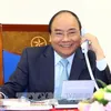 Japan and Vietnam PMs phone conference