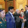 President meets former volunteer soldiers in Cambodia