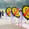 Leaders pay tribute to late leader, martyrs on National Day