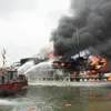 Tourist boat catches fire in Ha Long Bay