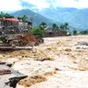 Dozens dead, missing in flash floods in the north