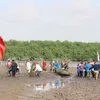 Japanese, Quang Ninh Red Cross volunteers plant mangrove forest