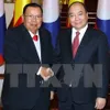 PM Nguyen Xuan Phuc meets Lao Party and State leader