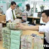 Reference exchange rate down by 3 VND at week’s beginning