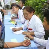 Driven by a passion to serve, doctors provide free care in Cambodia