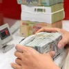 Reference exchange rate goes up 5 VND