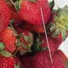 Australia strawberry scare: Woman arrested in Queensland