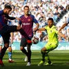 Barca ride luck to sink Sociedad, Real held in Bilbao