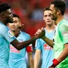 Adan penalty heroics help Atletico edge Arsenal in Singapore