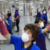 South Korea reduces work to 52 hours a week