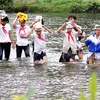 Students in Quang Ngai cross river to attend school