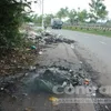 Untreated industrial waste piles up on street in HCM City