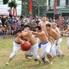 Village men wrestle for ball in unique festival in Hanoi