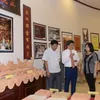 Exhibition promotes cultural and historical sites in Ninh Binh and Bac Lieu